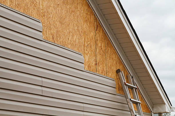 Professional Siding Contractor technician working in Schwenksville, PA